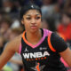 Jul 20, 2024; Phoenix, AZ, USA; Team WNBA forward Angel Reese gets in position against USA Women's National Team during the WNBA All Star Game at Footprint Center. Mandatory Credit: Joe Camporeale-USA TODAY Sports