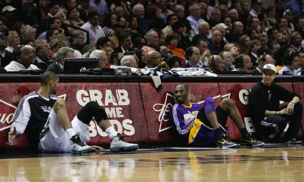 Dec 28, 2010; San Antonio, TX, USA; San Antonio Spurs forward Tim Duncan (left) talks with Los Angeles Lakers guard Kobe Bryant (right) during the first half at the AT&T Center. Mandatory Credit: Soobum Im-USA TODAY Sports