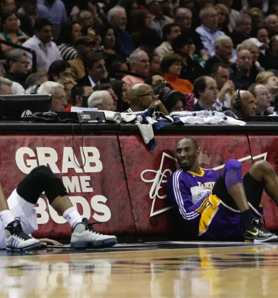 Dec 28, 2010; San Antonio, TX, USA; San Antonio Spurs forward Tim Duncan (left) talks with Los Angeles Lakers guard Kobe Bryant (right) during the first half at the AT&T Center. Mandatory Credit: Soobum Im-USA TODAY Sports