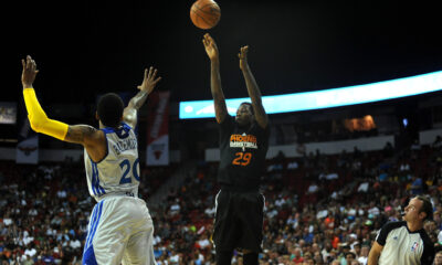 Jul 22, 2013; Las Vegas, NV, USA; Phoenix Suns guard Archie Goodwin lets a shot go over the defense of Golden State Warriors guard Kent Bazemore during the NBA Summer League Championship game at the Thomas and Mack Center. Mandatory Credit: Stephen R. Sylvanie-USA TODAY Sports