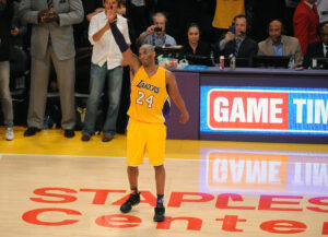 April 13, 2016; Los Angeles, CA, USA; Los Angeles Lakers forward Kobe Bryant (24) acknowledges spectators as he comes off the floor against Utah Jazz during the second half at Staples Center. Mandatory Credit: Gary A. Vasquez-USA TODAY Sports