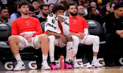 Dec 27, 2023; Houston, Texas, USA; (from L-to-R) Houston Rockets center Alperen Sengun (28), Houston Rockets guard Jalen Green (4) and Houston Rockets guard Fred VanVleet (5) sit on the bench during the fourth quarter against the Phoenix Suns at Toyota Center. Mandatory Credit: Erik Williams-USA TODAY Sports